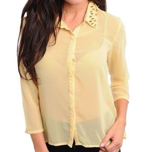 Yellow top with spikes.